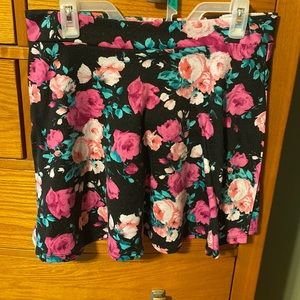 Black floral mini skirt